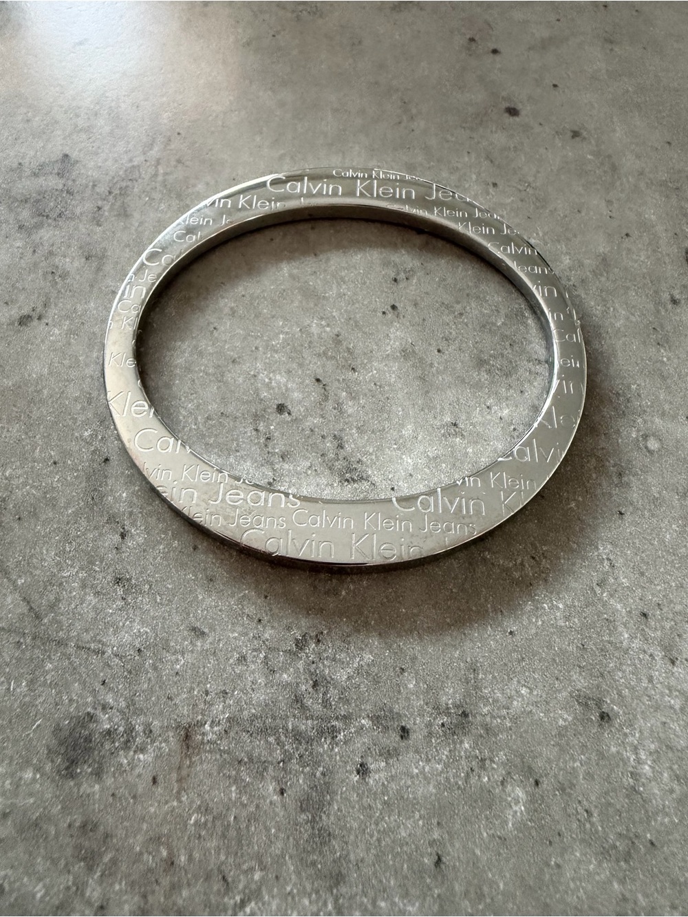 Calvin Klein Engraved Silver-Tone Logo Bangle